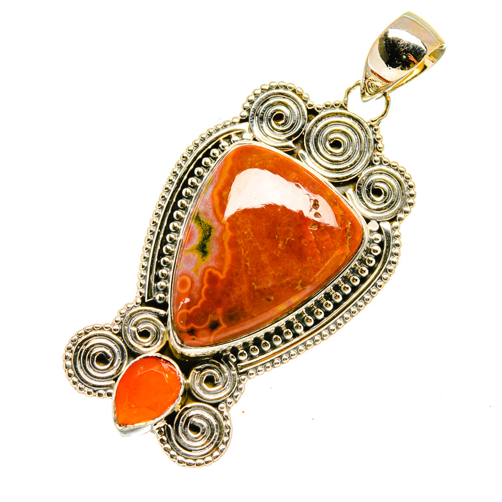 Orange-red jasper heart pendant with sterling silver filigree border and small round red stone