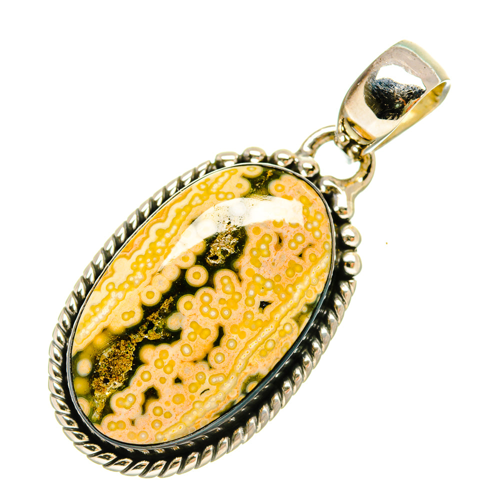 Oval ocean jasper pendant with ornate sterling silver frame and bail, yellow green