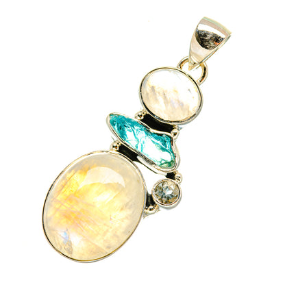Silver-tone pendant with two oval opal-like stones, teal bar, and small round blue gem