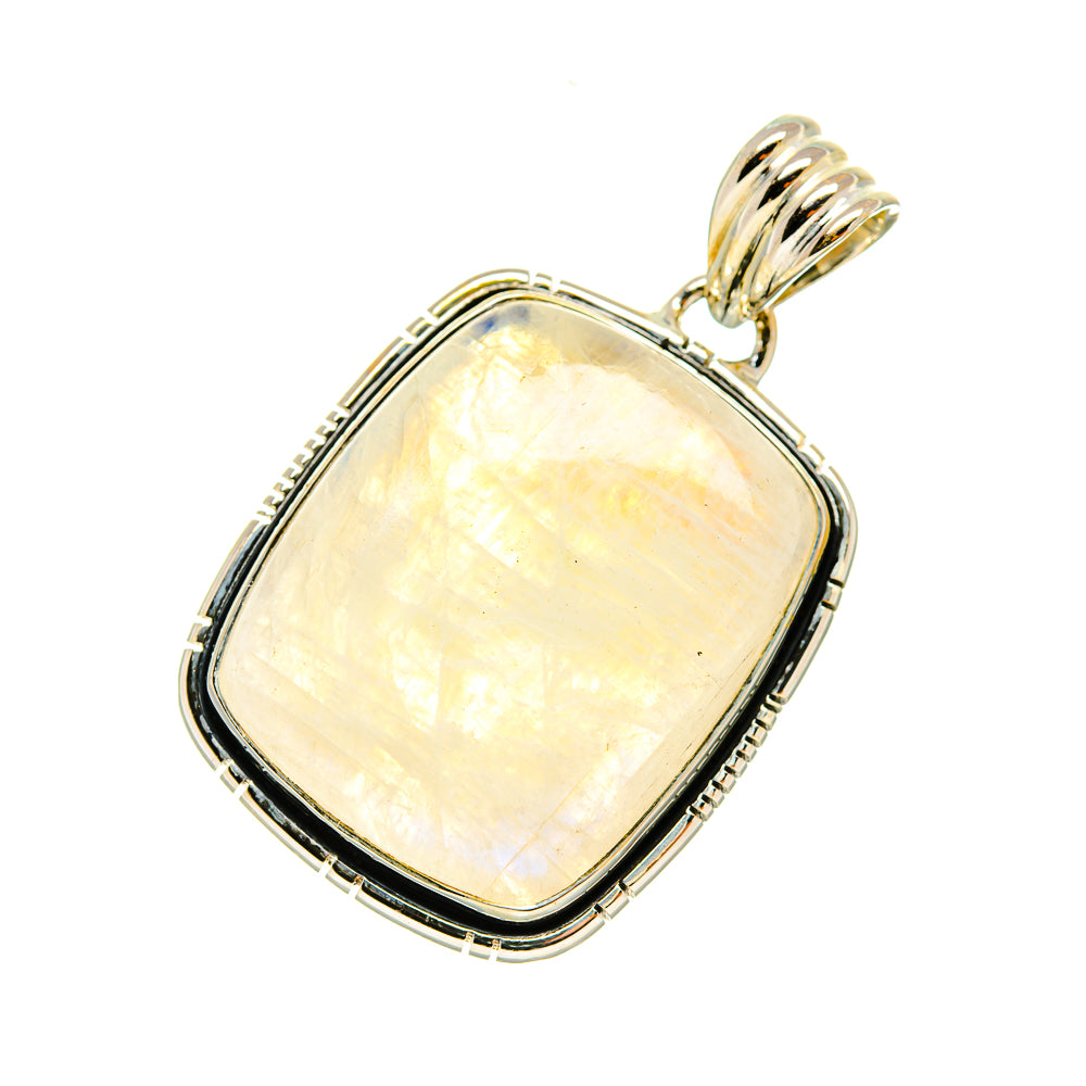Sterling silver moonstone pendant with rectangular bezel, iridescent glow, and top bail