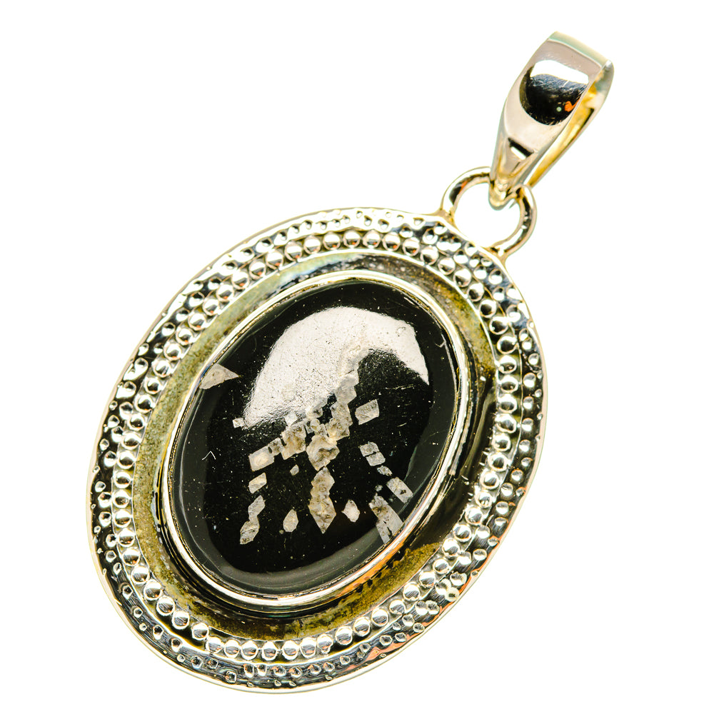 Sterling silver oval pendant with black stone, beaded frame, and bail