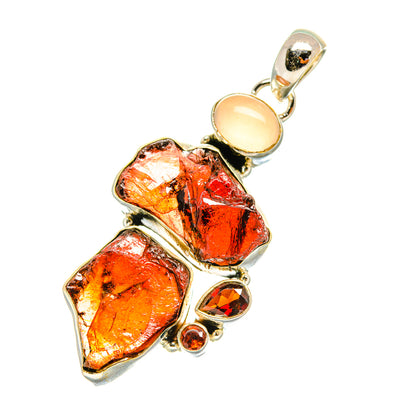 925 sterling silver pendant with rough red garnet and pale pink rose quartz cabochons