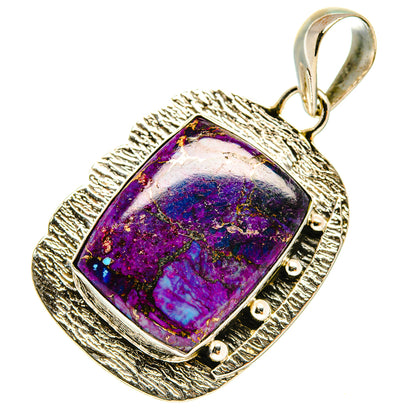 Silver loop pendant with square purple-blue gemstone set in textured frame