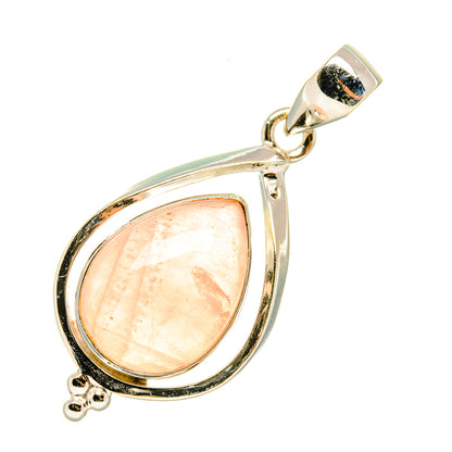 Sterling silver rose quartz teardrop pendant in glossy bezel frame