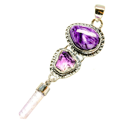 Sterling silver pendant with two purple oval cabochons and faceted crystal drop