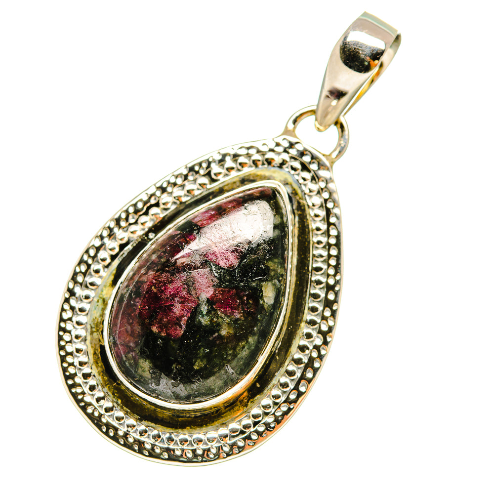 Silver-tone teardrop eudialyte pendant with beaded halo and black-red marbled stone