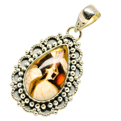 Teardrop jasper pendant with ornate silver bead rim and polished metal bail
