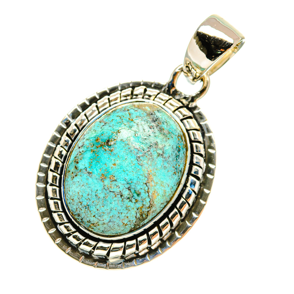 Oval turquoise pendant with detailed silver frame and hooked bail, sterling silver.