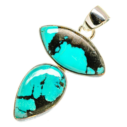 Sterling silver turquoise pendant with two teardrop cabochons, side view