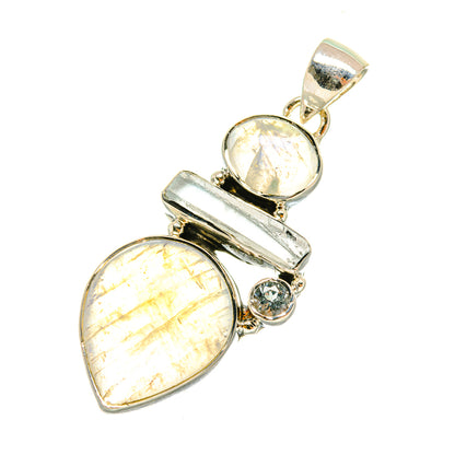 Sterling silver pendant with two pear moonstone cabochons and small blue topaz accent