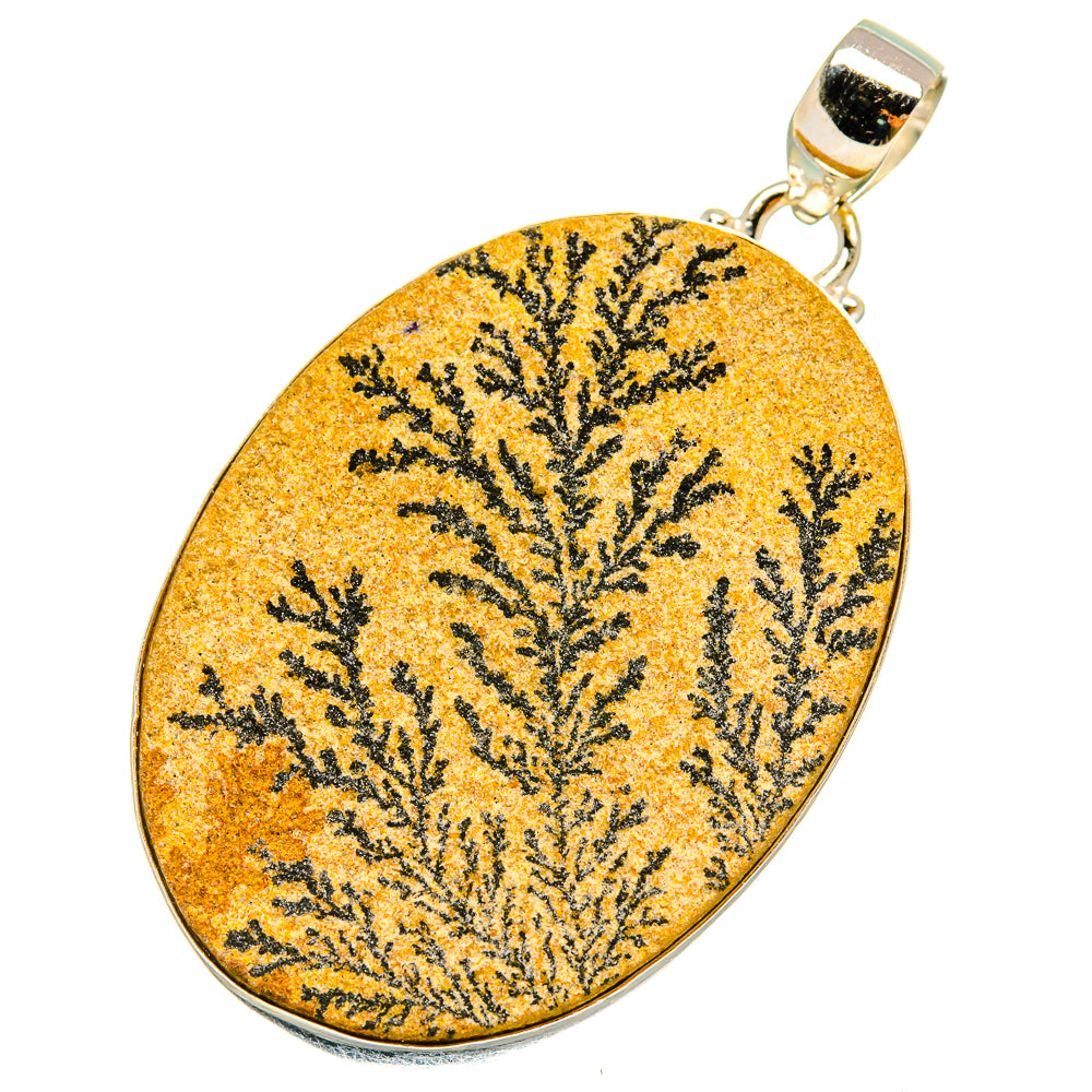 Oval psilomelane dendrite pendant in yellow-orange with black tree-like pattern, silver bail
