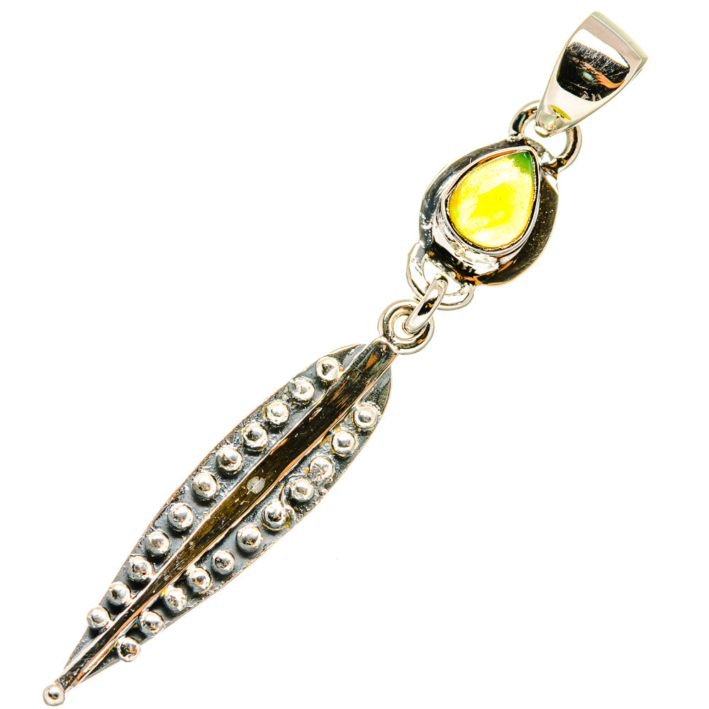 Sterling silver opal pendant with oval yellow-green stone, chain links, pointed dangle