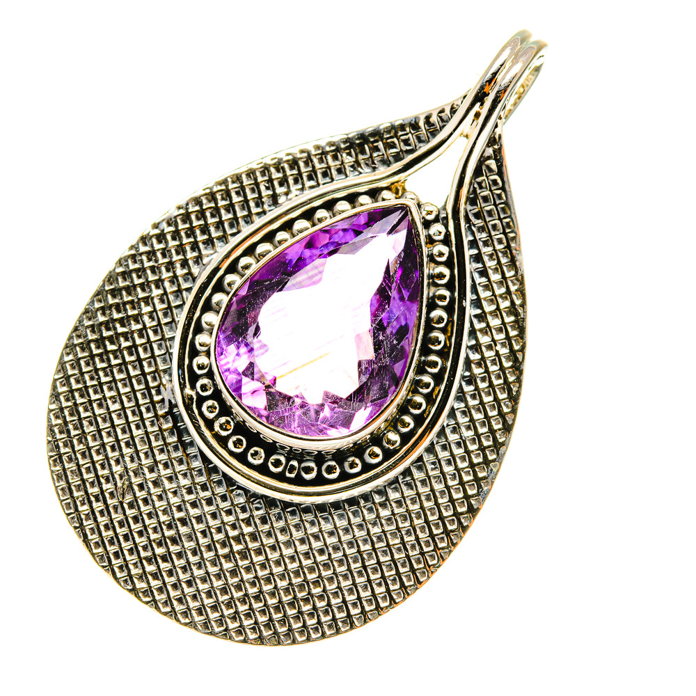 Sterling silver teardrop pendant with faceted purple amethyst stone