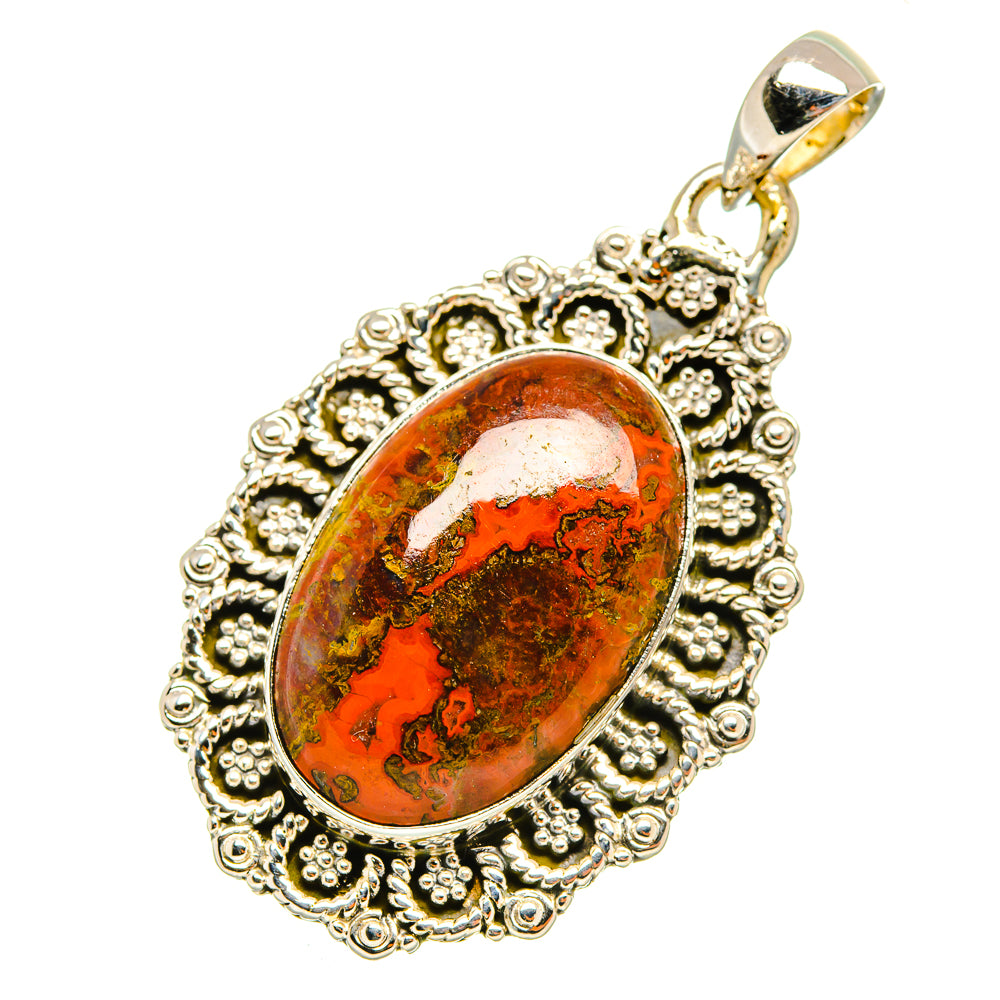 Agate pendant featuring an orange-red oval stone set in a detailed silver filigree bezel