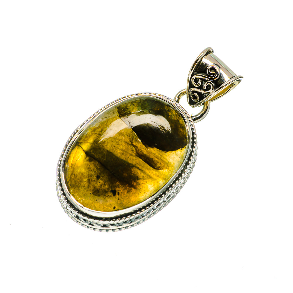 Oval labradorite pendant in sterling silver bezel with decorative bail