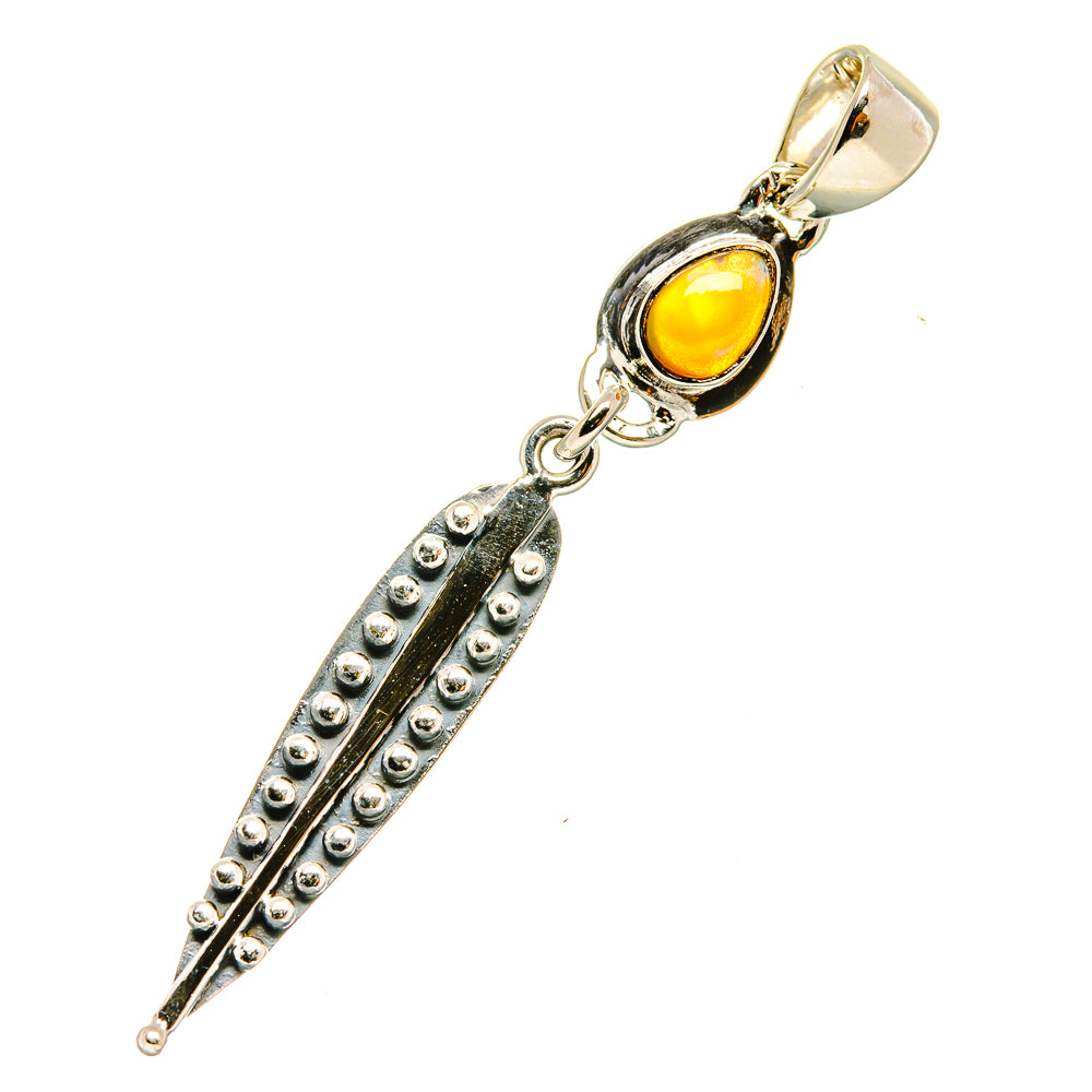 Opal pendant in sterling silver with yellow bezel, loop bail, and long studded bar
