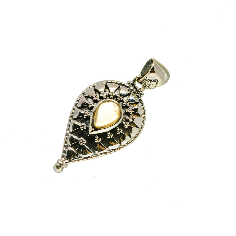 Sterling silver citrine teardrop pendant with prong-set yellow gemstone and bail