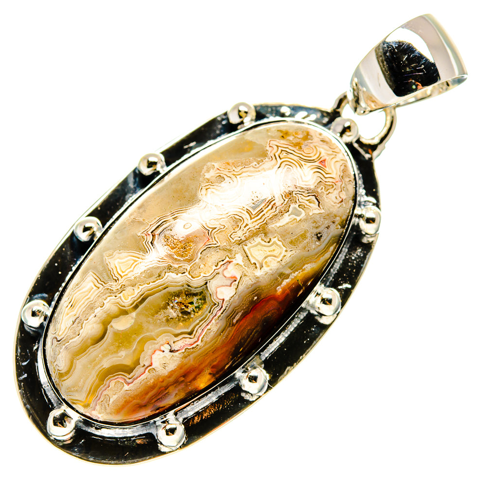 Oval sterling silver agate pendant with black setting and lace-like stone centerpiece