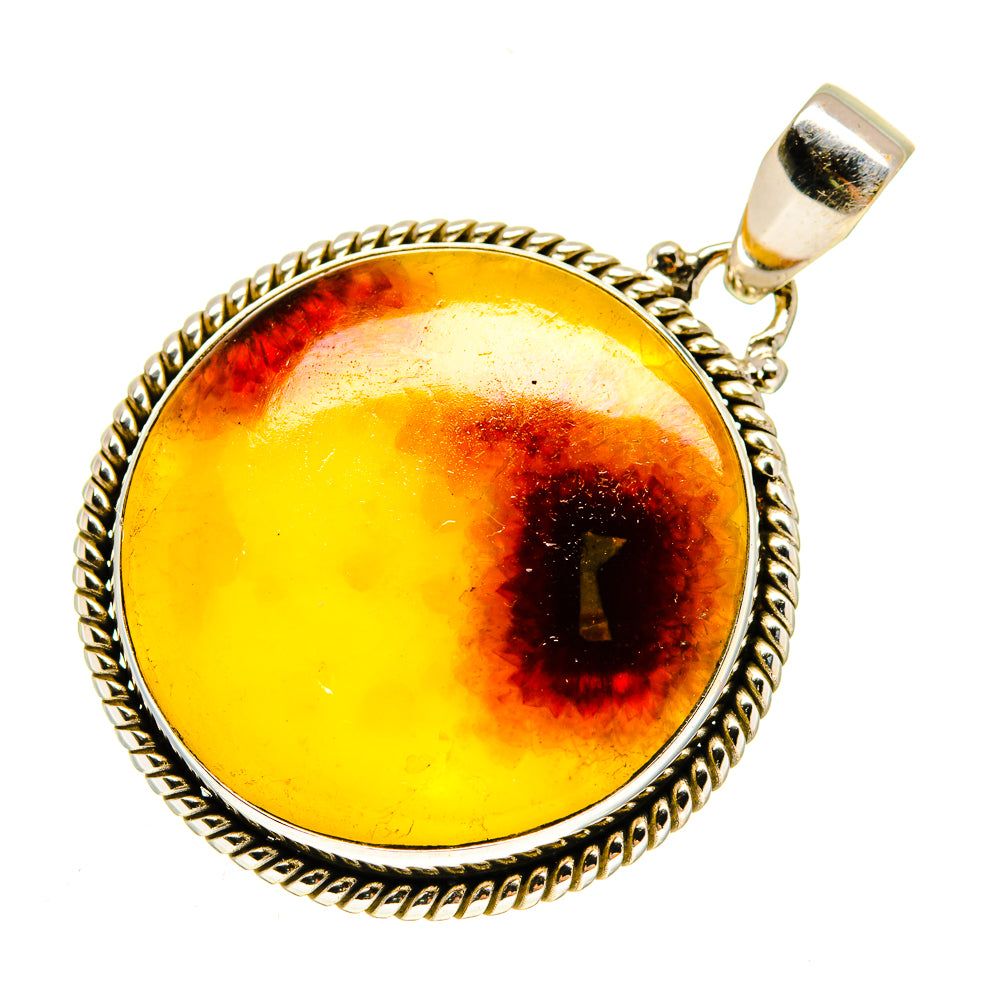 Septarian nodule pendant in silver with round amber-yellow stone, red-brown patches