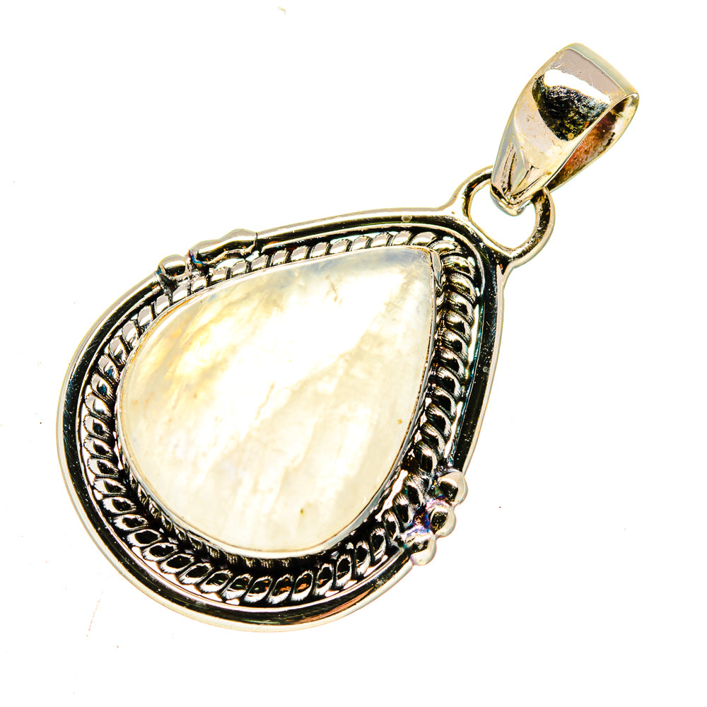Moonstone pendant teardrop bezel with ornate silver frame and bail, opalescent white.