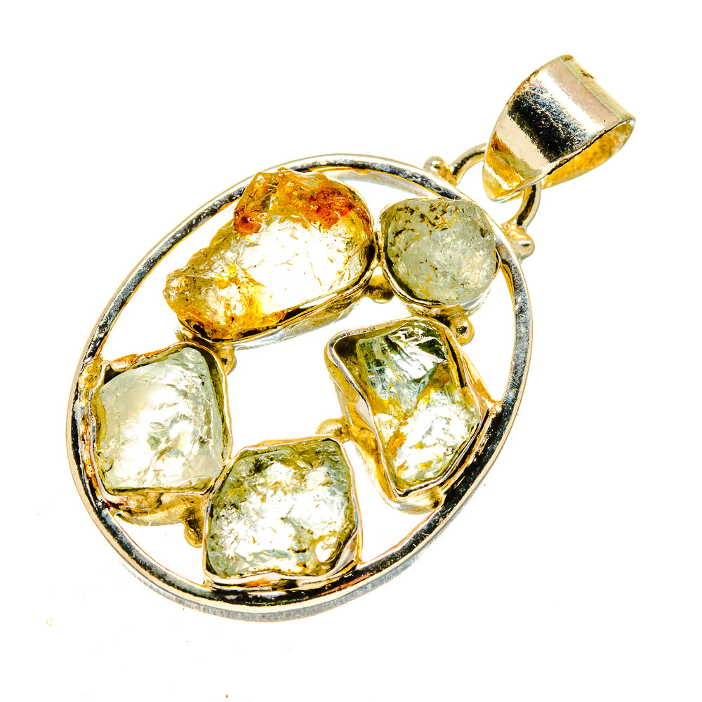 Rough gemstone pendant with circular silver frame and bail, amber and green stone pieces