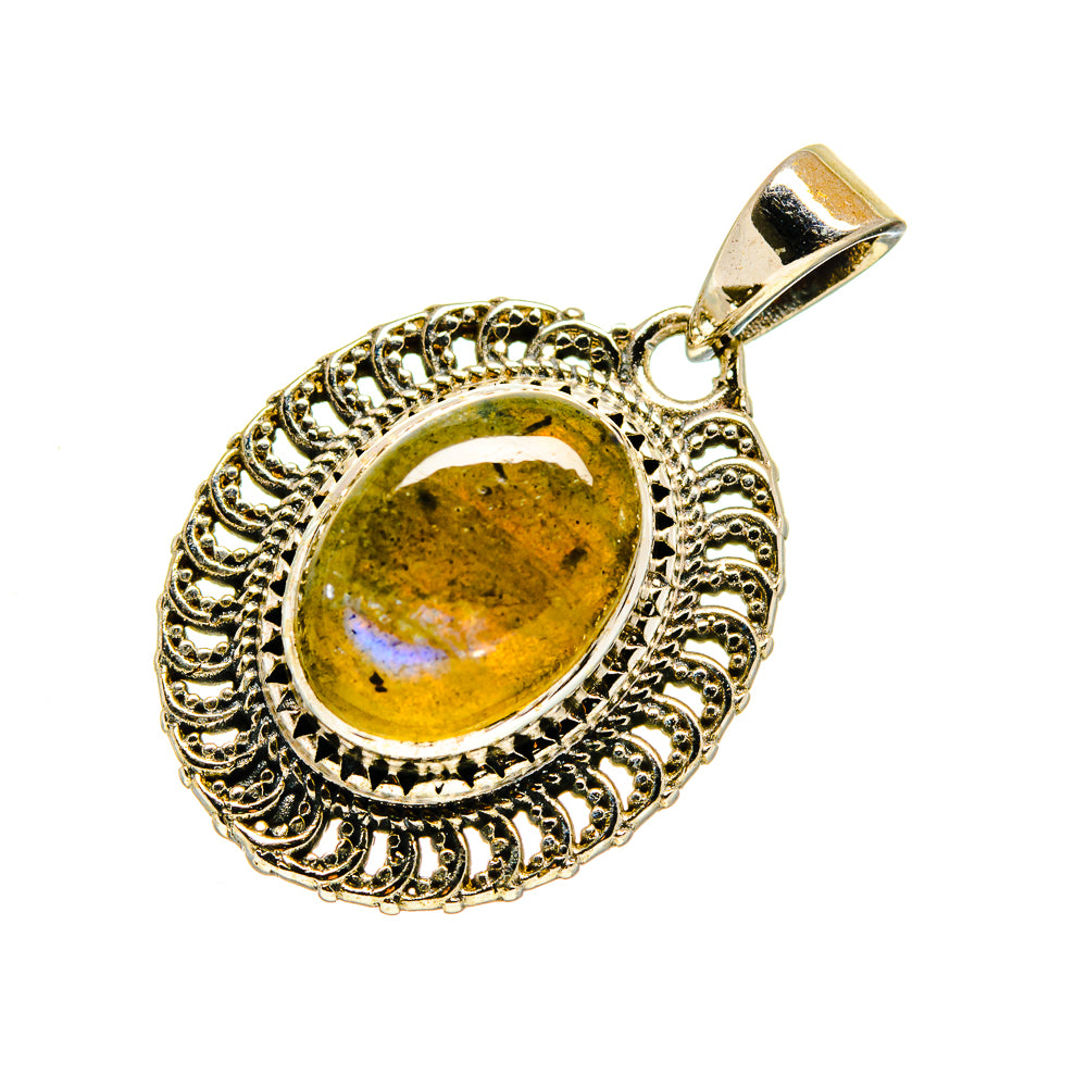 Gold-tone ornate pendant with oval labradorite stone and top bail