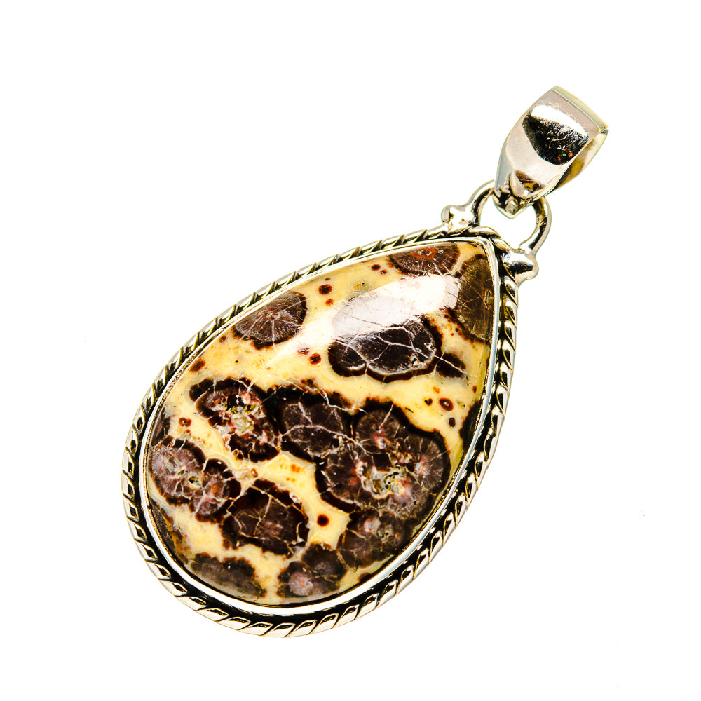 Silver teardrop pendant with bail over mottled brown, cream, and red jasper stone