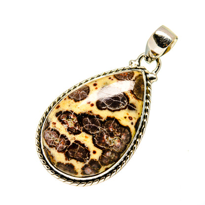 Silver teardrop pendant with bail over mottled brown, cream, and red jasper stone