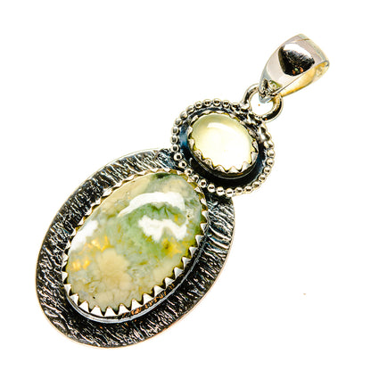 Sterling silver pendant with oval green and yellow cabochon stones, textured frame