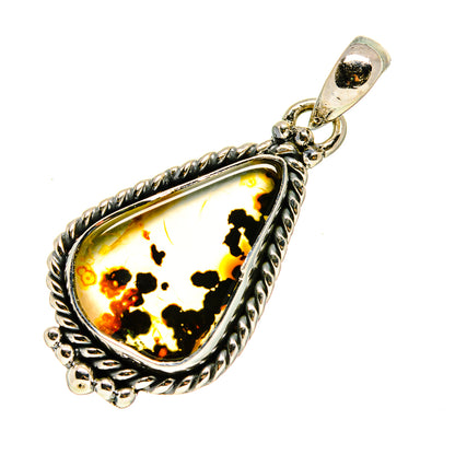 Teardrop amber agate pendant in twisted silver frame with black speckled stone