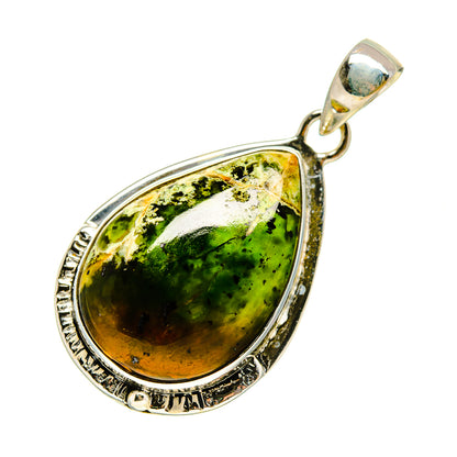 Sterling silver green opal teardrop pendant with ornate border and loop bail
