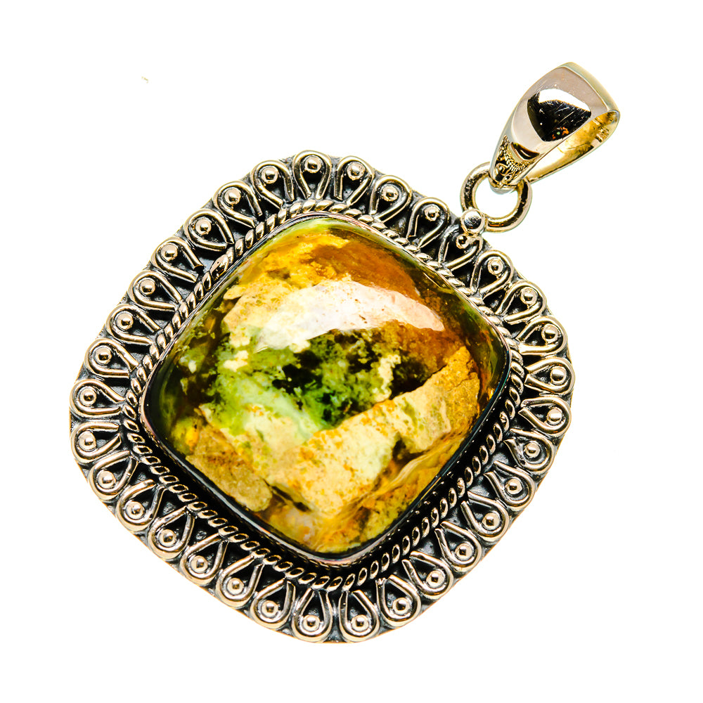 Sterling silver opal pendant with ornate frame and oval green-yellow stone, hanging bail