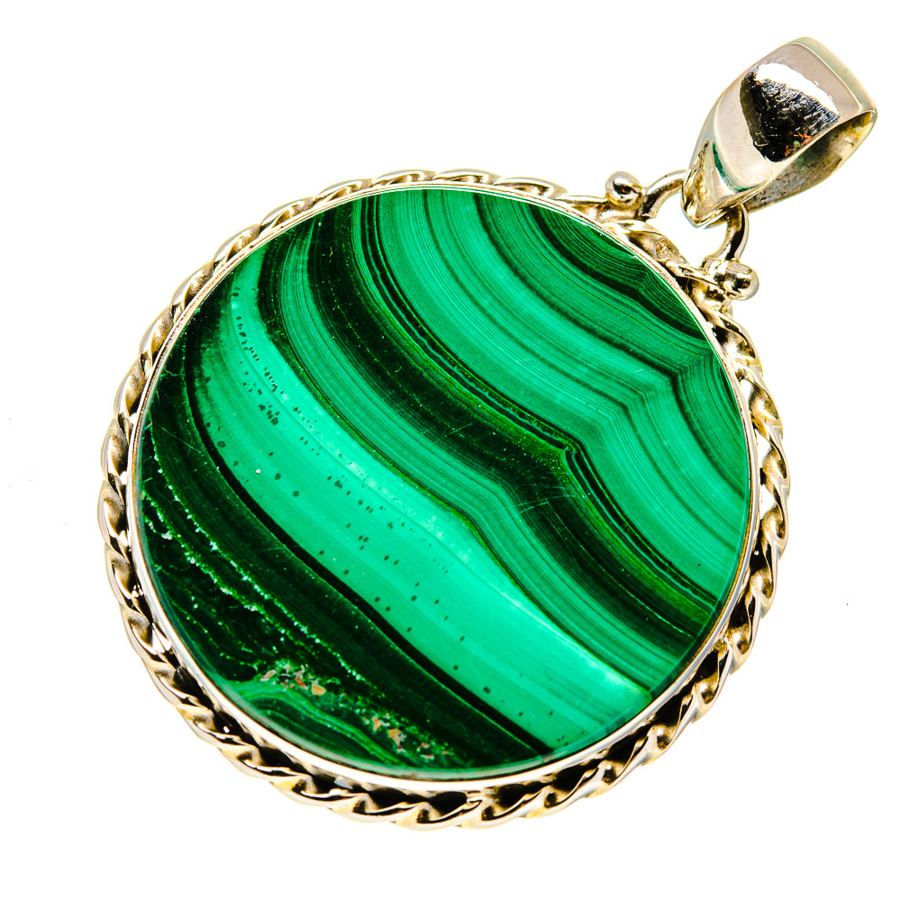 Malachite pendant with oval green stone, ornate silver-tone bezel and bail loop