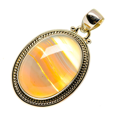 Oval Botswana agate pendant, honey-orange translucent stone in sterling silver bezel