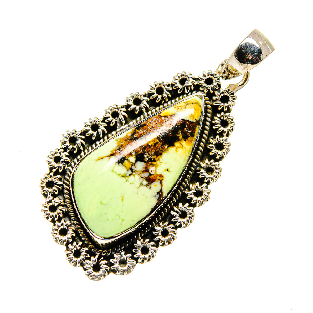 Chrysoprase pendant with teardrop green-yellow stone, ornate silver border and bail
