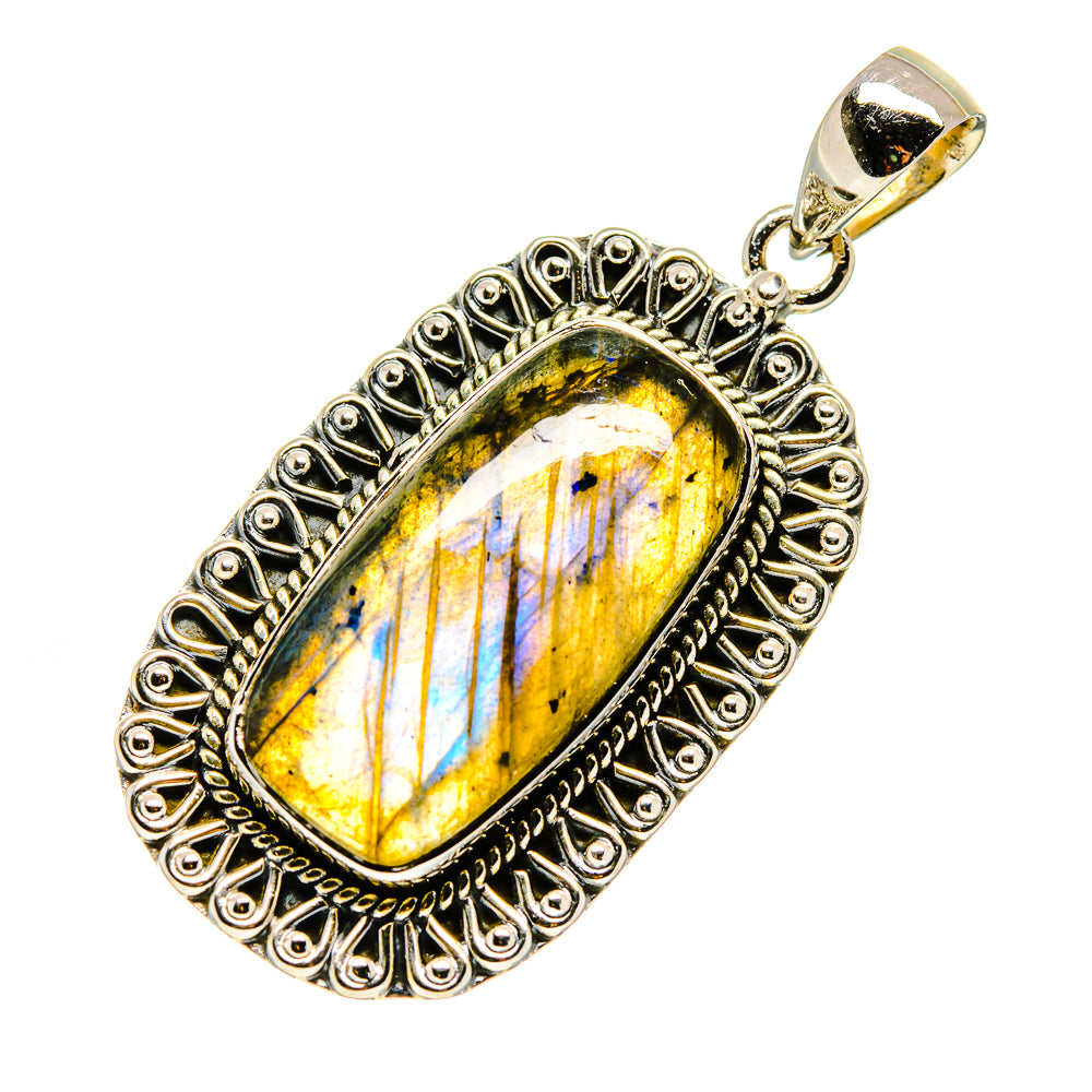 Oval labradorite pendant with yellow and blue iridescence in ornate sterling silver frame