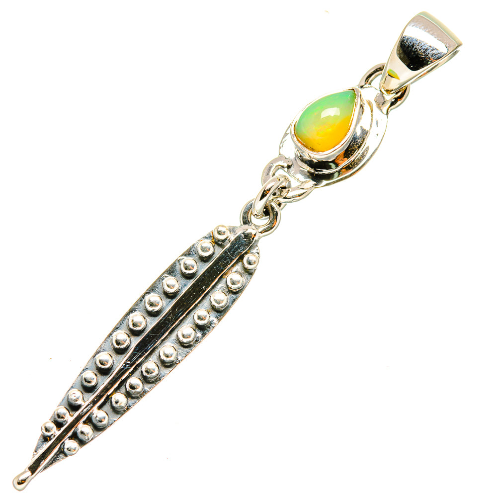 Sterling silver opal pendant with green-yellow teardrop stone, textured black centerpiece
