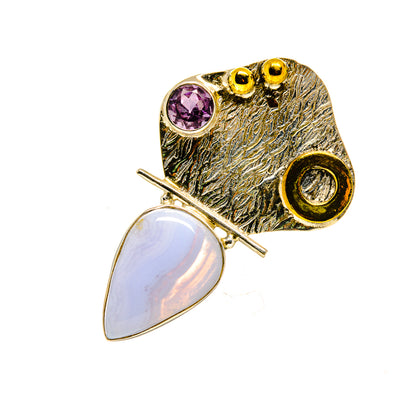 Stone pendant with purple round gem, teardrop opal, textured gold-tone frame