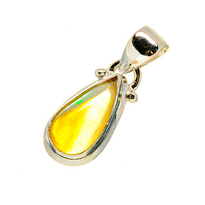 Sterling silver opal teardrop pendant with black bezel and gold-tone frame