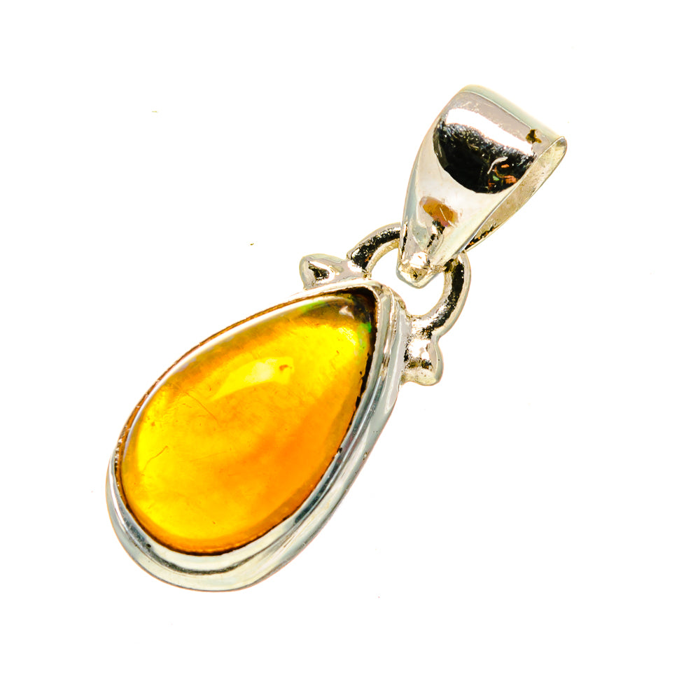 Teardrop opal pendant with amber-orange stone in silver bezel and hanging bail