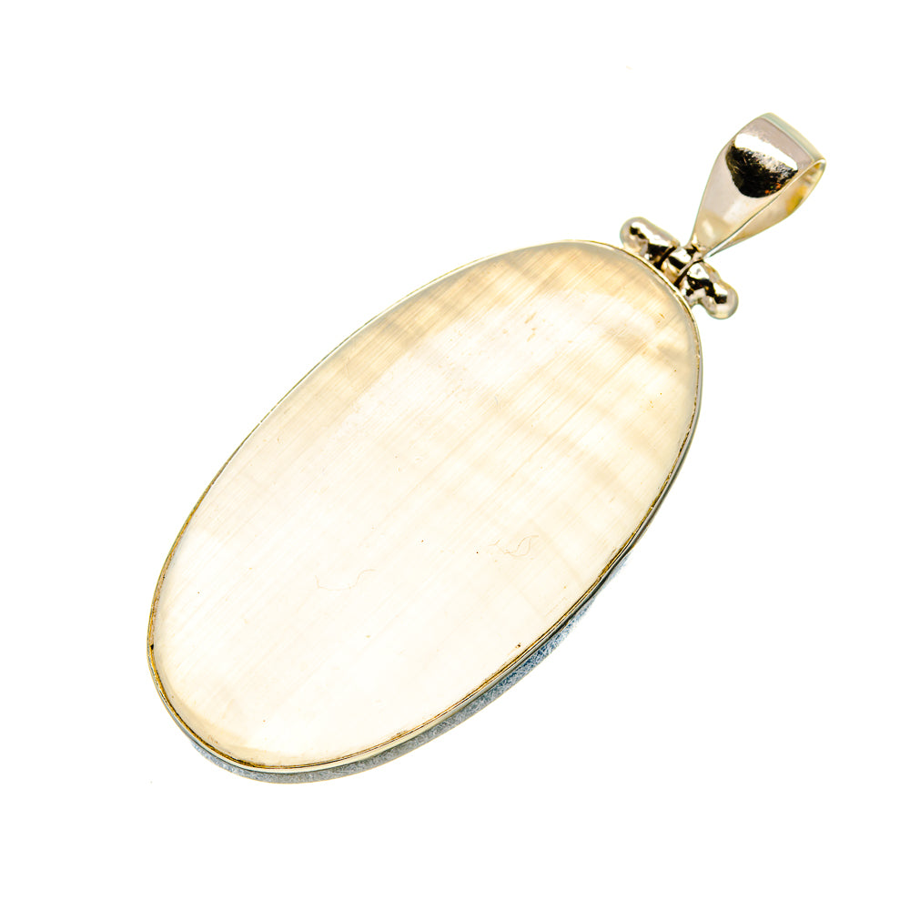 Oval moonstone pendant with pale gold sheen, sterling silver bail and setting