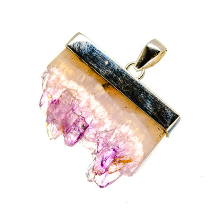 Amethyst stalactite pendant with silver frame and bail, purple druse crystals.