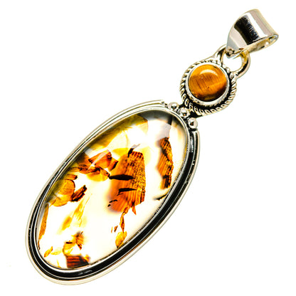 Oval tiger eye pendant in sterling silver bezel with hanging bail