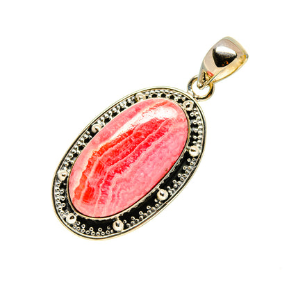 Oval rhodochrosite pendant with pink striped stone, ornate silver frame and loop top