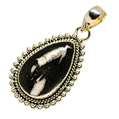 Black teardrop pendant with silver bail and beaded frame, marbled white streaks