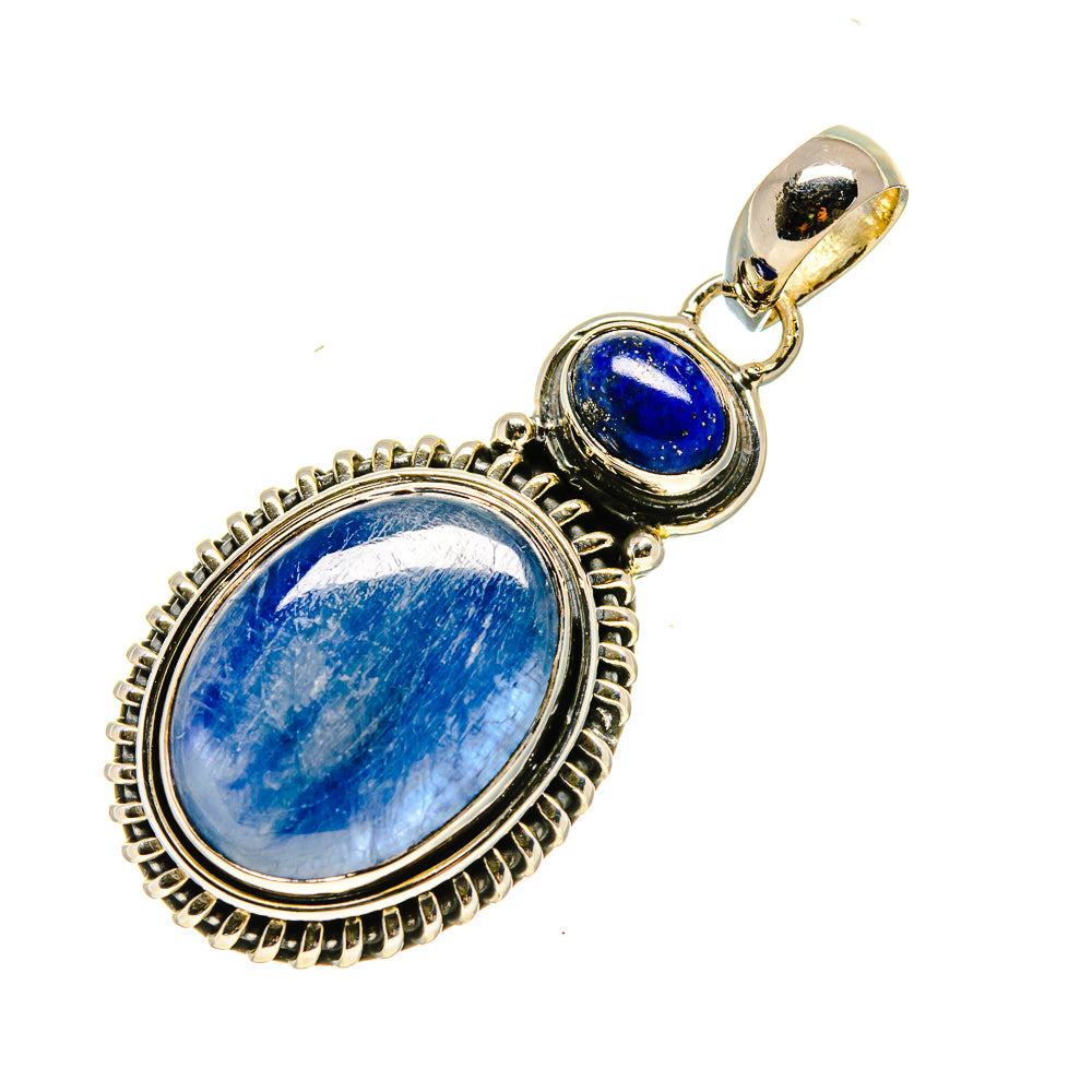 Oval lapis lazuli pendant with blue cabochon bezel and round bail, silver tone
