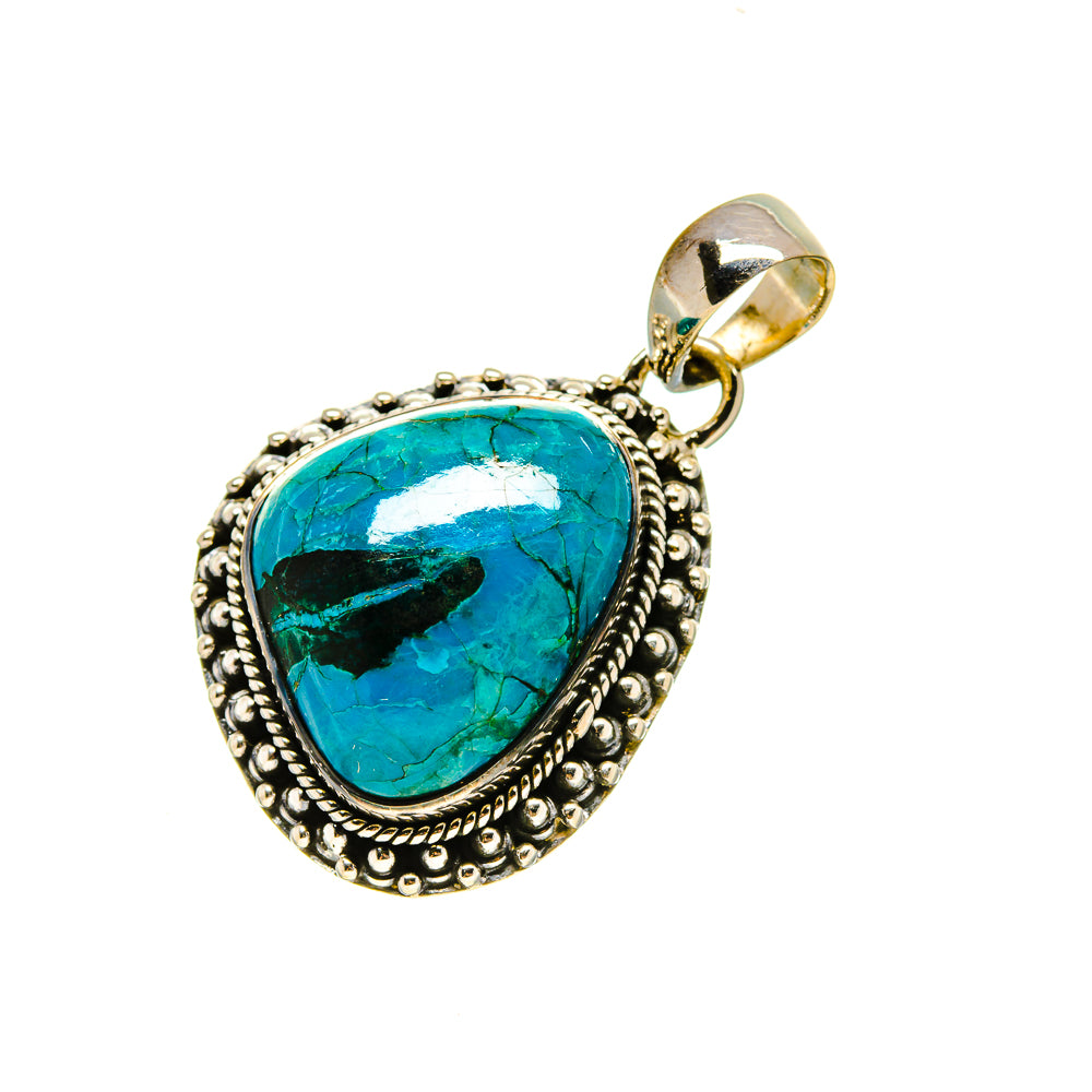 Turquoise teardrop pendant in silver-tone setting with textured border