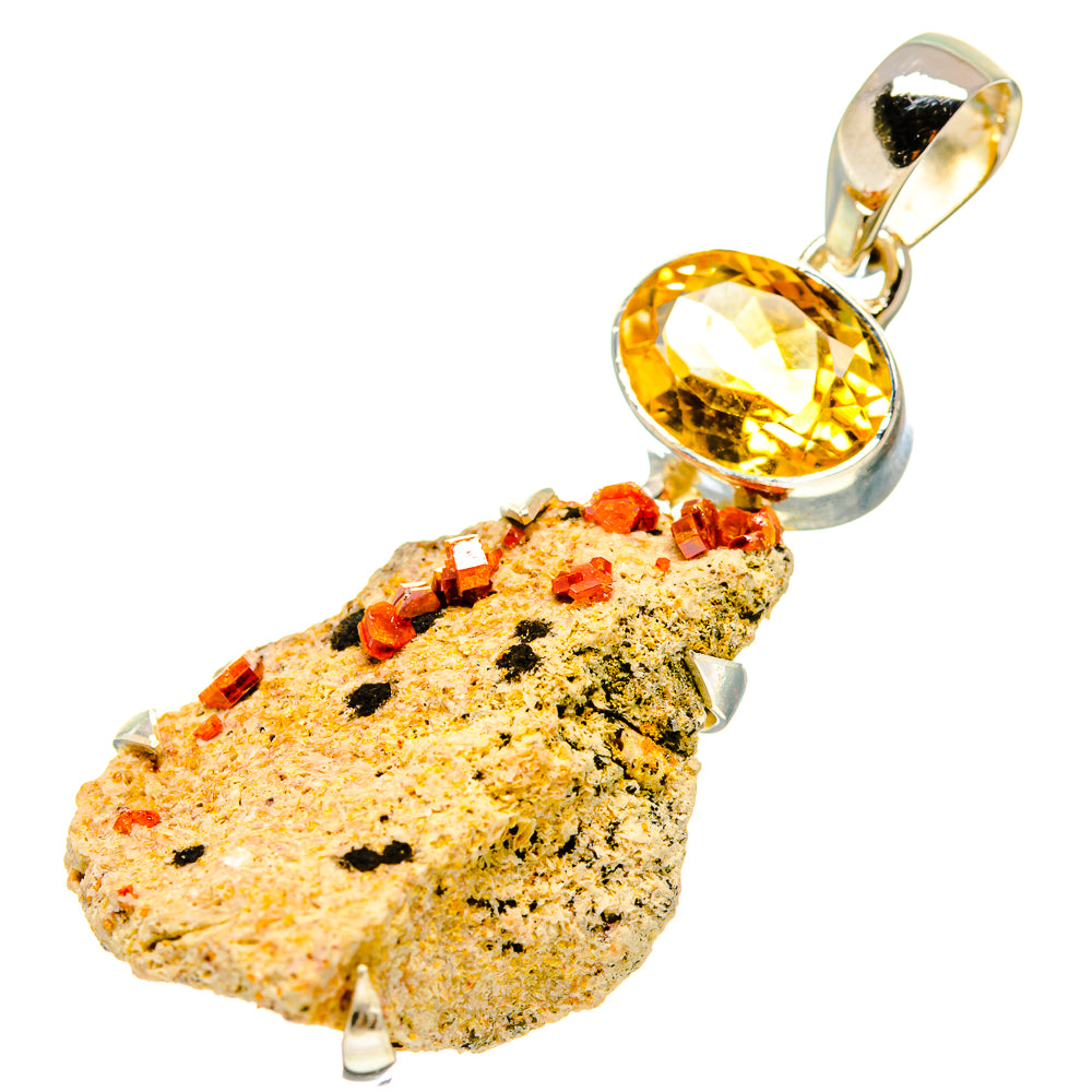 Citrine and mineral pendant with yellow oval stone and silver bail, rough slice detail