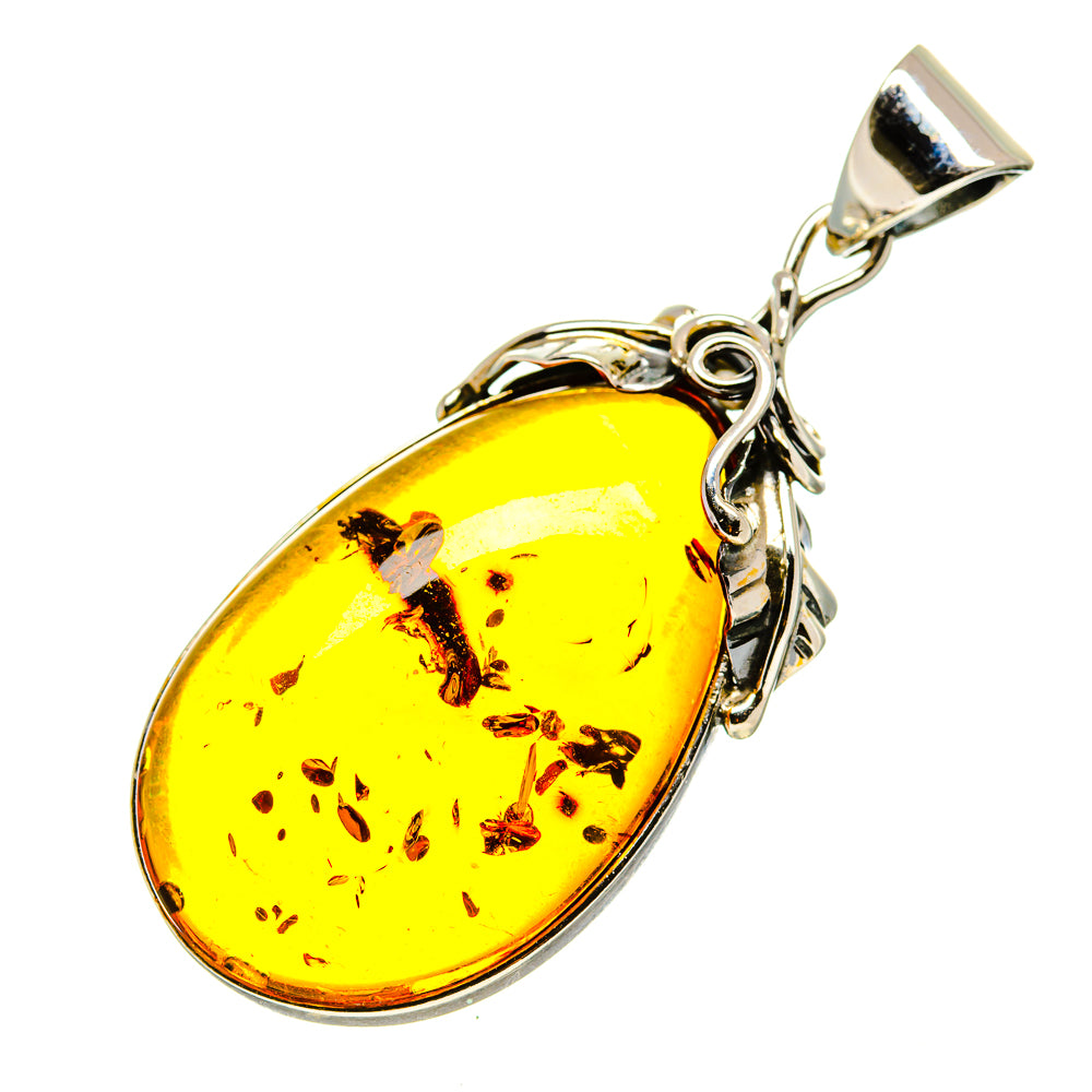Oval yellow Baltic amber pendant in polished 925 sterling silver setting with bail
