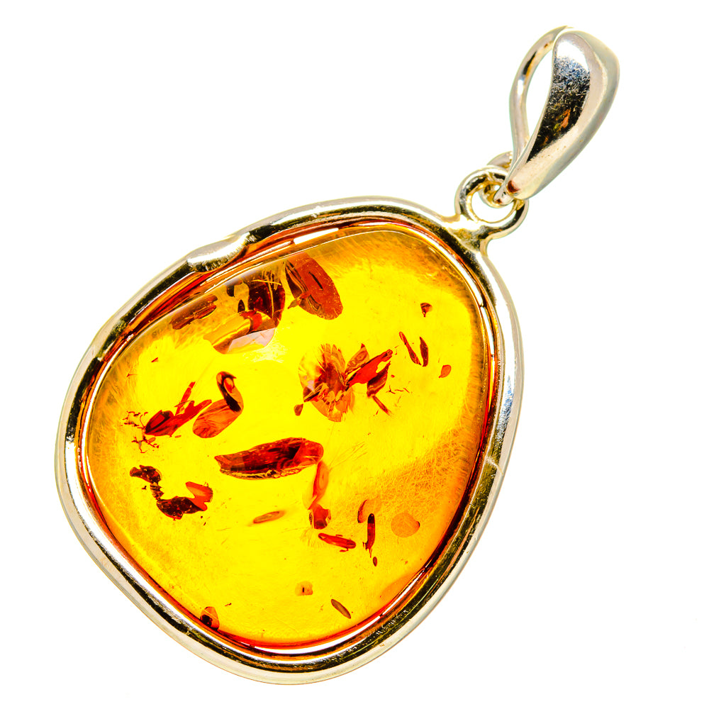 Heart-shaped amber pendant in 925 sterling silver with loop bail